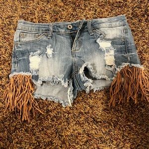 Western denim shorts with fringe